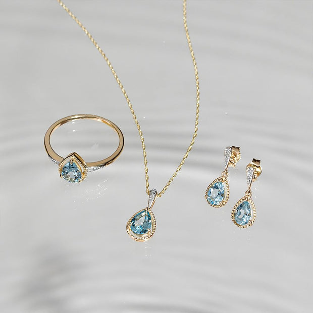 Collana classica con pendente a forma di pera, acquamarina e diamanti in oro giallo 9 carati