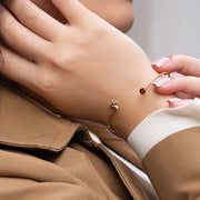 Bracciale Gardenia Fox in oro giallo 9 carati con Granato