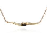 Bracciale twist da 19 cm con zaffiro marquise e diamanti in oro giallo da 9 ct
