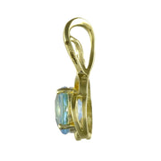 Ciondolo e orecchini floreali classici con topazio azzurro in oro giallo 375 e diamanti