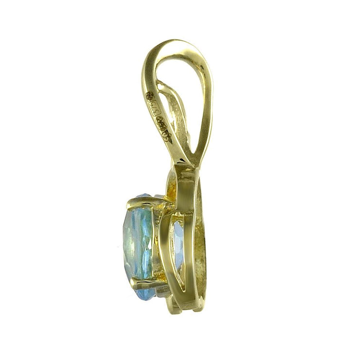 Ciondolo e orecchini floreali classici con topazio azzurro in oro giallo 375 e diamanti
