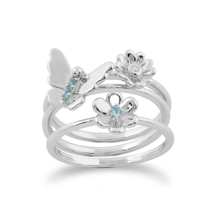 Set di tre anelli floreali impilabili in oro bianco 375 con topazio azzurro e farfalla e fiori di diamanti