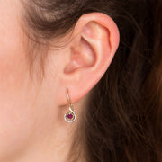 Orecchini con rubini, orecchini pendenti a spirale in oro giallo con rubini da 9 ct e diamanti