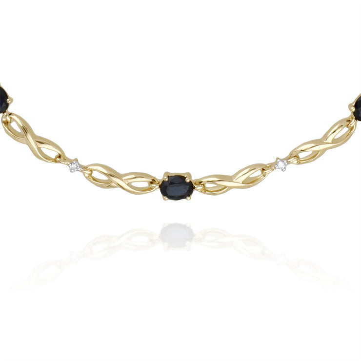 Bracciale da 19 cm con motivo infinito in oro giallo da 9 ct con zaffiri marquise e diamanti