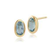 Orecchini a bottone classici in oro giallo 375 con topazio azzurro con castone ovale
