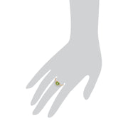 Anello Gemondo in oro giallo da 9 ct con peridoto aureola e diamanti a taglio rotondo
