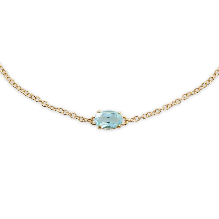 Bracciale e pendente classici in oro giallo 375 con topazio azzurro ovale