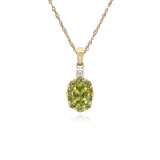 Pendente con peridoto rotondo e diamanti su montatura ovale in oro giallo da 9 ct su catena da 45 cm