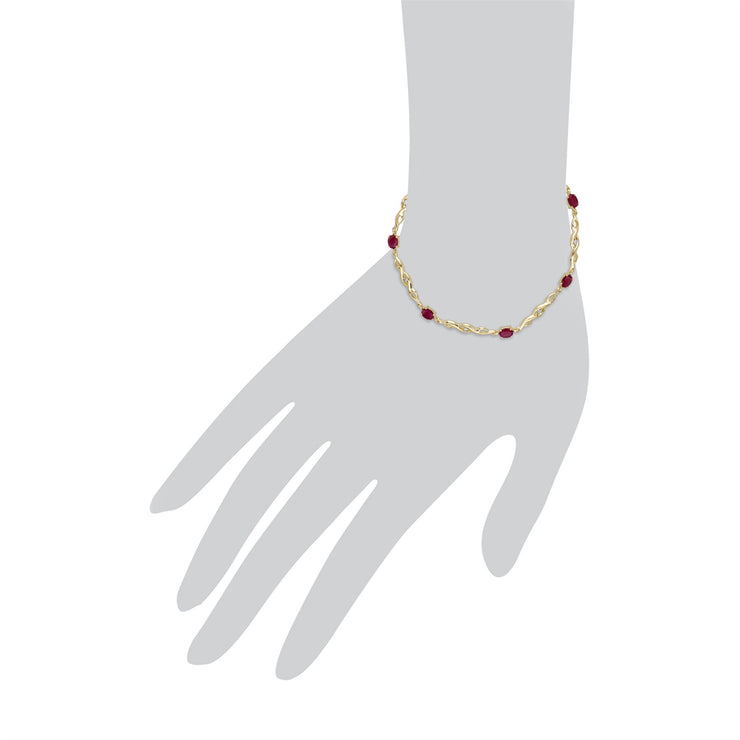Bracciale tennis ovale da 18 cm con rubini e diamanti in oro giallo da 9 ct