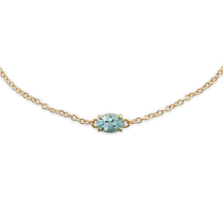 Classico bracciale ovale con acquamarina in oro giallo 375 e orecchini pendenti