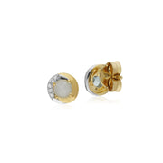 Orecchini a bottone bicolore in oro giallo da 9 ct con topazio azzurro e diamanti