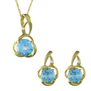 Ciondolo e orecchini floreali classici con topazio azzurro in oro giallo 375 e diamanti