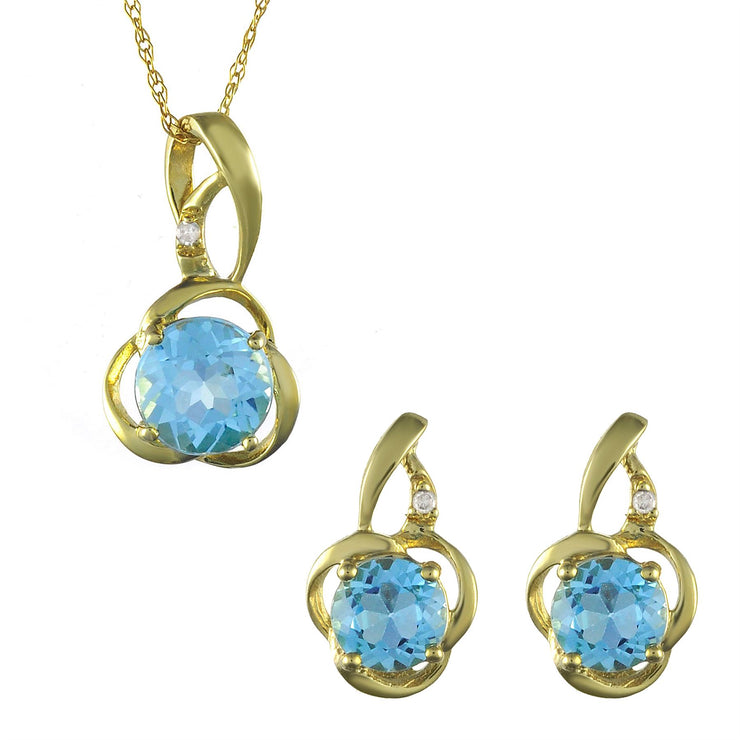 Ciondolo e orecchini floreali classici con topazio azzurro in oro giallo 375 e diamanti