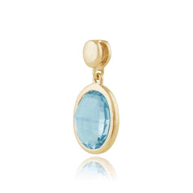 Ciondolo ovale blu in oro giallo con topazio