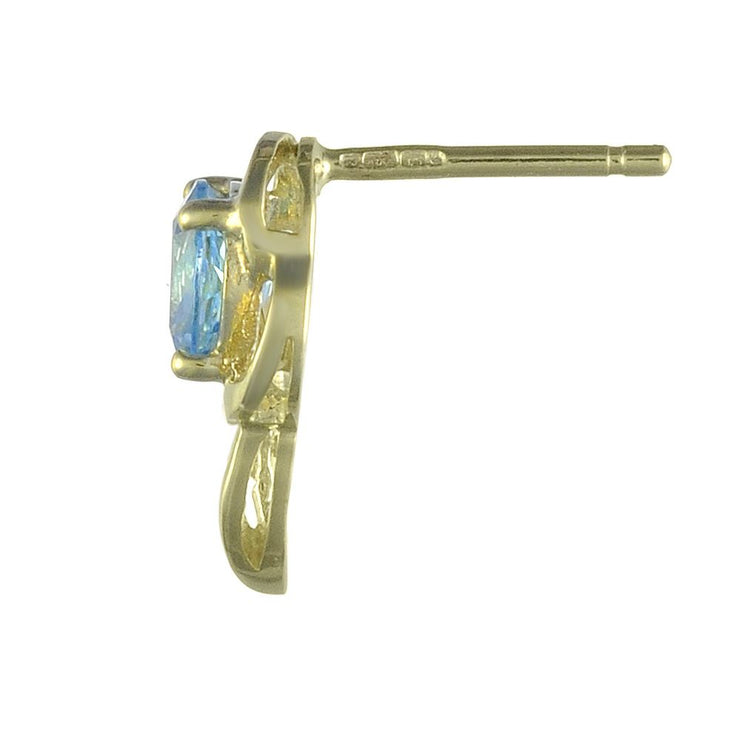 Ciondolo e orecchini floreali classici con topazio azzurro in oro giallo 375 e diamanti