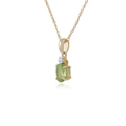 Classico pendente ovale con peridoto in oro giallo 375 e diamanti