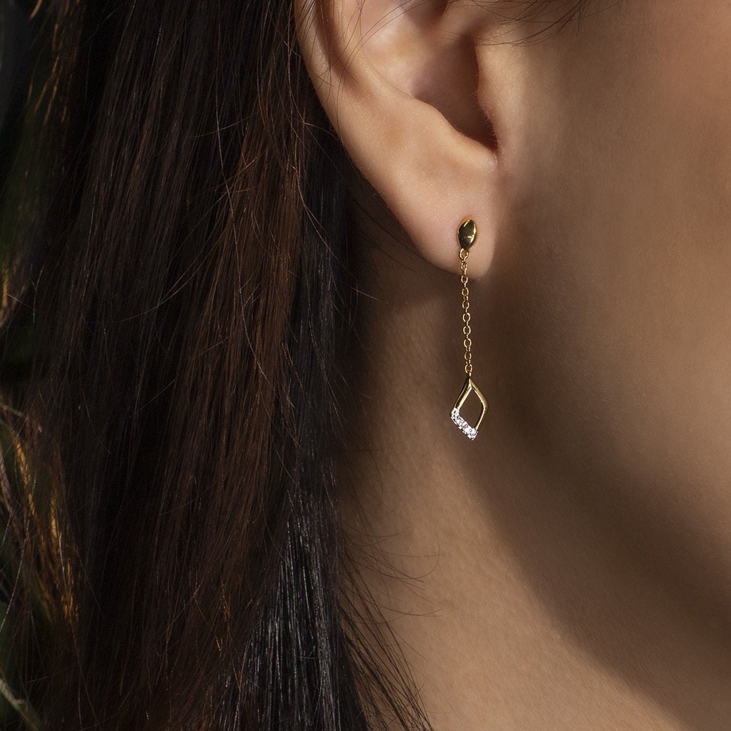 Mismatched Diamond Dangle Drop Earrings in Yellow Gold on Model